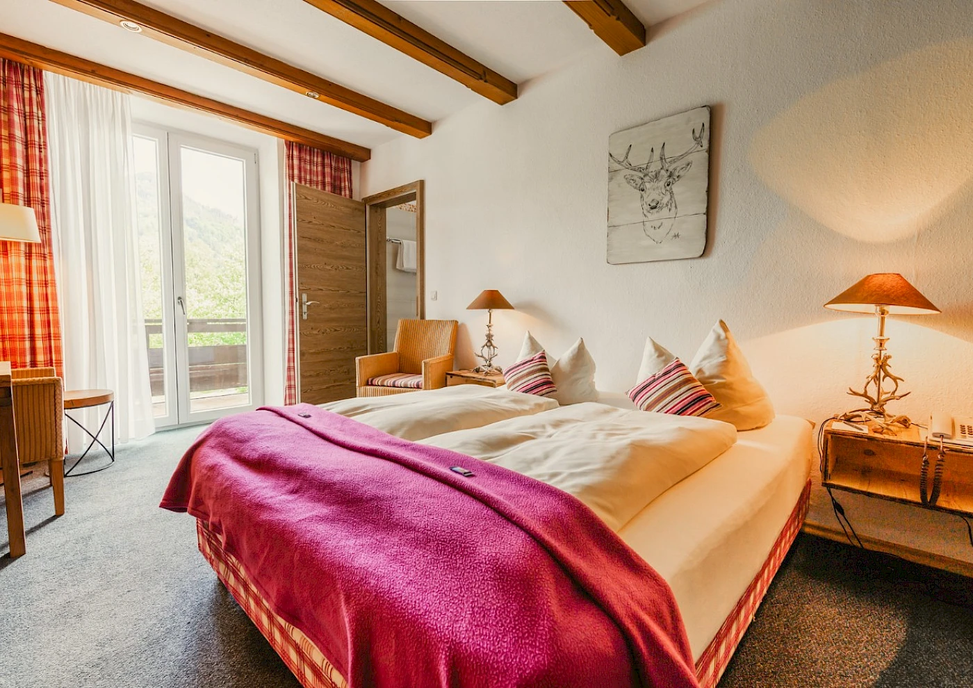 Doppelzimmer mit Balkon und Seeblick im Schlierseer Hof